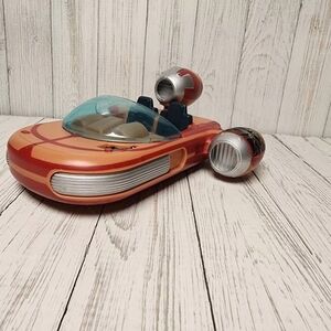 Kids Toy Spaceship with Orange and Silver Design